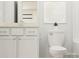 Bright bathroom featuring white cabinetry, modern fixtures, and a clean design at 4104 Skyboat Cir, Fort Mill, SC 29715