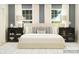 Serene bedroom featuring a large bed, stylish bedside tables, and soft, neutral tones at 4171 Skyboat Cir, Fort Mill, SC 29715
