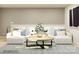 This modern living room offers a plush white sofa and bright natural light at 4171 Skyboat Cir, Fort Mill, SC 29715