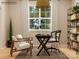 This home office features natural light, stylish decor, and a cozy workspace at 4203 Skyboat Cir, Fort Mill, SC 29715
