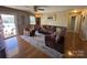 Inviting living room with comfortable seating, ceiling fan, and a view of the outdoors at 52 Restful Ln, Hickory, NC 28601