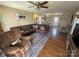 Open living space with hardwood floors, comfortable seating, and views to dining area at 52 Restful Ln, Hickory, NC 28601
