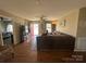 Cozy living room with hardwood floors and an inviting red front door at 52 Restful Ln, Hickory, NC 28601