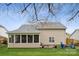 Well-maintained backyard features a screened porch, patio and a cozy seating area with a fire pit at 5386 Josephine Sw Ln, Concord, NC 28027