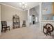 Dining room with elegant chandelier, neutral walls, and open view to the living area at 5386 Josephine Sw Ln, Concord, NC 28027