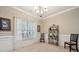 Comfortable dining area with a large window, neutral walls, and stylish decor at 5386 Josephine Sw Ln, Concord, NC 28027