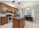 Well-equipped kitchen with modern appliances, island and dining area for easy meals at 5386 Josephine Sw Ln, Concord, NC 28027