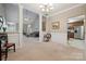 Open floor plan showcasing living, dining, and kitchen areas with neutral finishes at 5386 Josephine Sw Ln, Concord, NC 28027
