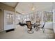 Bright sunroom offers ceiling fans and a scenic view of the spacious backyard and mature trees at 5386 Josephine Sw Ln, Concord, NC 28027