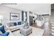 Cozy living room with comfortable seating, stylish decor, and open to kitchen at 6029 Fonsac Ln # 2008C, Charlotte, NC 28217
