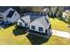 A charming single-story home features a well-manicured lawn, fresh landscaping, and a neatly paved driveway at 611 Chase Brook Dr, Rock Hill, SC 29732