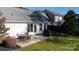 Backyard patio with outdoor furniture set on a sunny lawn at 611 Chase Brook Dr, Rock Hill, SC 29732