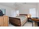 Comfortable bedroom with vaulted ceiling, a ceiling fan, and ample natural light from the windows at 611 Chase Brook Dr, Rock Hill, SC 29732