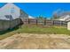 Backyard featuring a concrete patio and a wooden fence at 6821 Parkers Crossing Dr, Charlotte, NC 28215