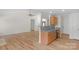 Living room with breakfast bar and view to kitchen at 6821 Parkers Crossing Dr, Charlotte, NC 28215