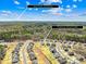 Sweeping aerial shot of a new neighborhood featuring lush greenery, community pool, and easy access to Uptown Charlotte at 7313 Glenroe Dr, Huntersville, NC 28078