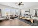 Bright exercise room with large windows and equipment at 7313 Glenroe Dr, Huntersville, NC 28078
