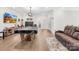 A game room offers a pool table, TV, and comfortable seating at 7313 Glenroe Dr, Huntersville, NC 28078