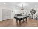 A large game room features a pool table and recessed lighting at 7313 Glenroe Dr, Huntersville, NC 28078