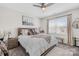 Comfortable main bedroom suite with a queen-size bed, and a neutral palette at 7313 Glenroe Dr, Huntersville, NC 28078