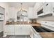 Functional kitchen featuring essential appliances and a view into the living area at 816 Gentlewinds Ct, Fort Mill, SC 29708