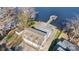 Aerial view of the waterfront property with a private dock and ample parking space at 938 Pinehaven Dr, New London, NC 28127