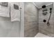 Tiled shower with rainfall shower head at 938 Pinehaven Dr, New London, NC 28127