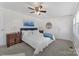 Comfortable bedroom with carpet, ceiling fan, and natural light at 938 Pinehaven Dr, New London, NC 28127