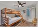 Bedroom with bunkbeds and storage unit at 938 Pinehaven Dr, New London, NC 28127