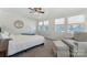 Bright bedroom featuring large windows with lovely views at 938 Pinehaven Dr, New London, NC 28127