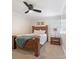 Cozy bedroom with a wooden bed frame and a nightstand at 938 Pinehaven Dr, New London, NC 28127