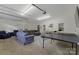 Garage that has been converted into a living space with an area for games and entertainment at 938 Pinehaven Dr, New London, NC 28127