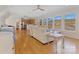 Bright living room with a lake view, hardwood floors, and lots of seating at 938 Pinehaven Dr, New London, NC 28127