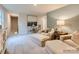 Inviting living room with cozy seating, side table, and stylish decor at 10014 Chatham Run Ln, Charlotte, NC 28262