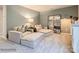 Comfortable living room featuring plush seating, soft carpet, and decorative wall mirror at 10014 Chatham Run Ln, Charlotte, NC 28262