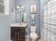 Bathroom with a single vanity, toilet, and a shower with decorative curtain at 1041 Crofton Dr, Waxhaw, NC 28173