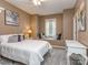 Comfortable bedroom with window seat, carpet, and a neutral color scheme at 1041 Crofton Dr, Waxhaw, NC 28173