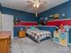 Bedroom with colorful walls, carpet, and playful decorations at 1041 Crofton Dr, Waxhaw, NC 28173