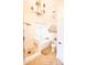 Bright bathroom featuring tile floors, a soaking tub, and a separate glass-enclosed shower at 118 Heathrow Ln, Statesville, NC 28677