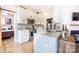 Updated kitchen with marble countertops, stainless appliances, and barndoor access at 118 Heathrow Ln, Statesville, NC 28677