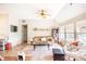 Inviting living room with a ceiling fan, neutral walls, and a comfortable seating arrangement at 118 Heathrow Ln, Statesville, NC 28677