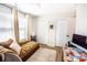 Bright office with a comfortable lounge sofa, desk, and plenty of natural light at 118 Heathrow Ln, Statesville, NC 28677