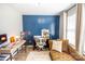 Bright office with a comfortable lounge sofa, desk, and plenty of natural light at 118 Heathrow Ln, Statesville, NC 28677