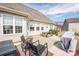 Charming patio featuring a grill and picnic table, ideal for outdoor dining and relaxation at 118 Heathrow Ln, Statesville, NC 28677