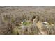 Aerial view of multiple homes in a wooded area at 119 Old Hearth Rd, Clover, SC 29710