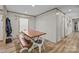 Charming dining room featuring a wooden table and natural light from the window at 119 Old Hearth Rd, Clover, SC 29710