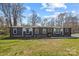 Charming single story home featuring two-tone siding and a well-maintained lawn at 119 Old Hearth Rd, Clover, SC 29710