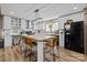 Bright kitchen featuring a large center island, modern appliances, and plenty of cabinet space at 119 Old Hearth Rd, Clover, SC 29710