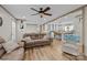 Inviting living room featuring a ceiling fan and open floor plan leading into the kitchen at 119 Old Hearth Rd, Clover, SC 29710