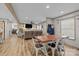 Open-concept living and dining area with wood-look flooring and plenty of natural light at 119 Old Hearth Rd, Clover, SC 29710